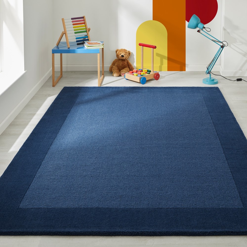 Colours Bordered Wool Rug in Navy Blue